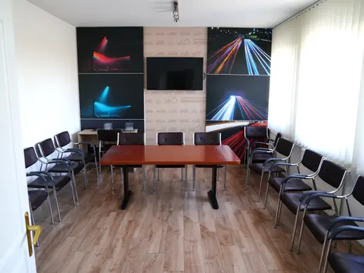 Classroom at the Harsona street exam base, with wall-mounted screen