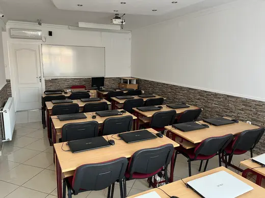 Classroom at the Debrecen Szent Anna street office, rows of desks with laptops