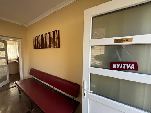The Balmazújváros office entrance from inside, with waiting bench
