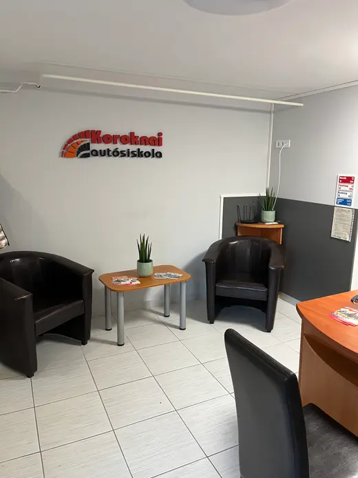 Waiting area at the Hajdúnánás office with the Koroknai logo on the wall